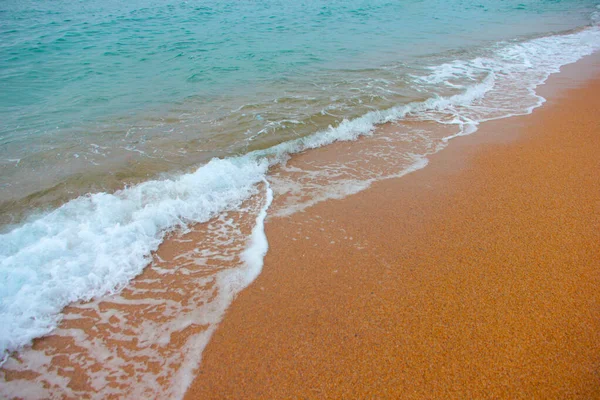 beautiful sandy beach and sea waves