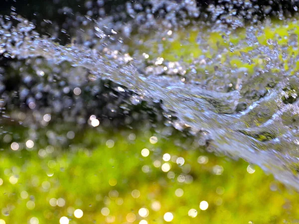 Clear Water Flow Watering Fresh Lawn Grass — Stock Photo, Image