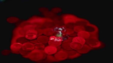 Kırmızı sıvı damlaları, Rus Rublesi 'nin metal yığınına düşer.