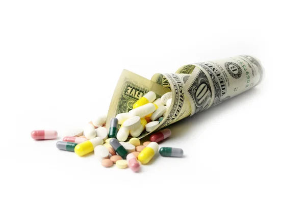 Dólares y medicamentos —  Fotos de Stock