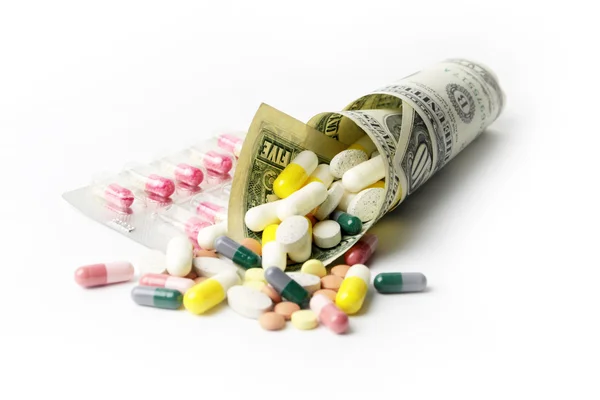 Dollars and medicines — Stock Photo, Image