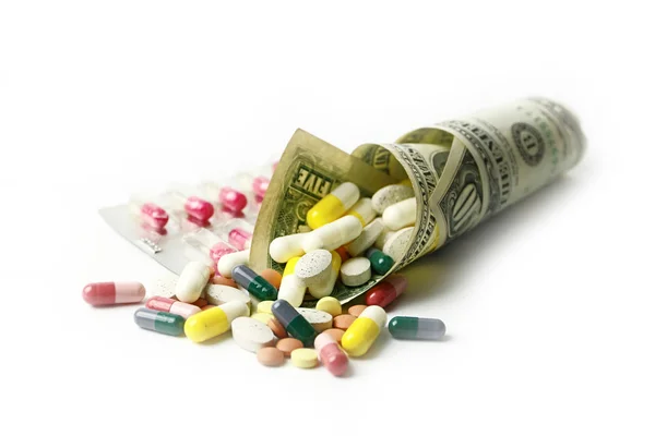 Dólares y medicamentos — Foto de Stock