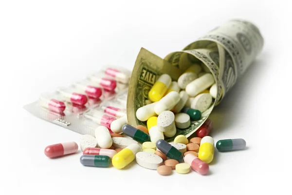 Dolarów i leków — Zdjęcie stockowe