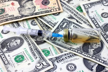 Şırınga, ampül ve dolar