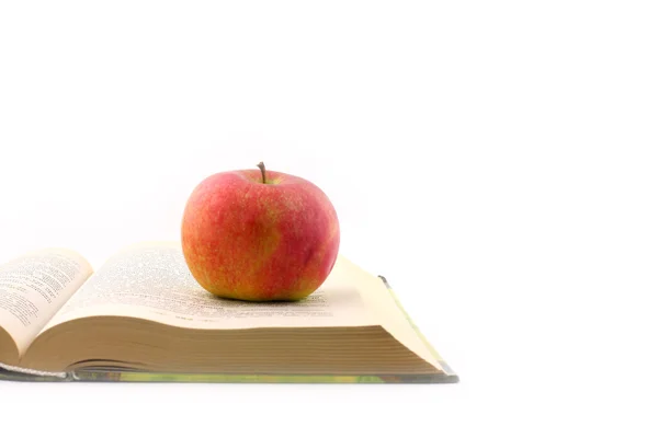 Kniha a apple — Stock fotografie