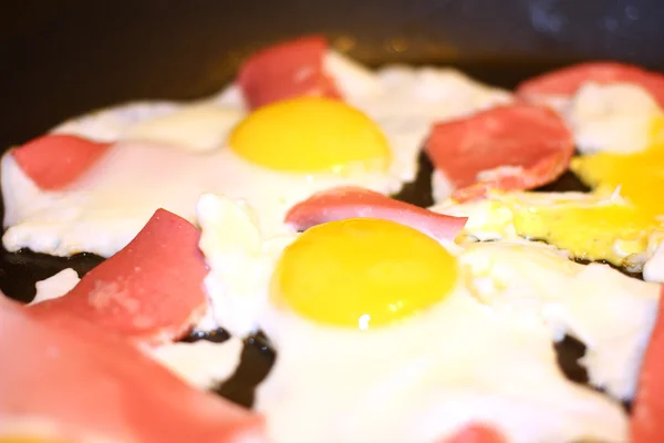 Fried eggs and sausage — Stock Photo, Image