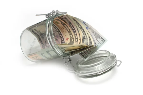 Dollars and a jar — Stock Photo, Image