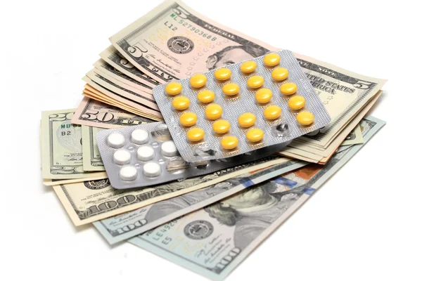 Dollars and pills — Stock Photo, Image