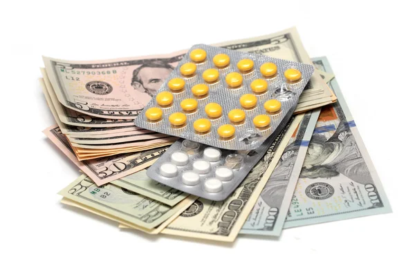 Dollars and pills — Stock Photo, Image