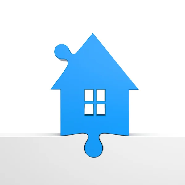 Blue house inserted as a puzzle — Stock Photo, Image