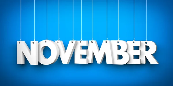 November woord op blauw — Stockfoto