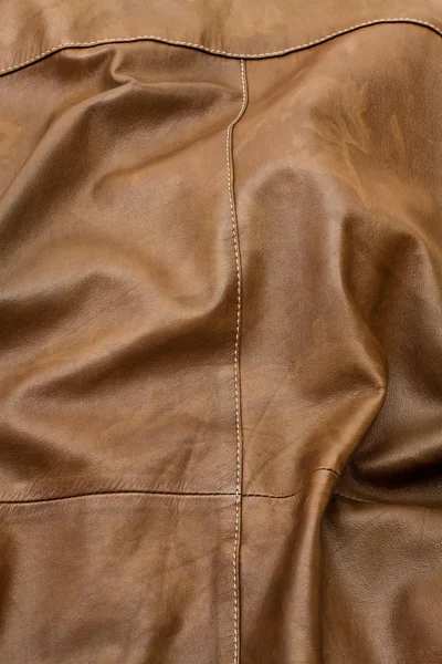 Detal lekkie brązowe skórzane ubrania — Zdjęcie stockowe
