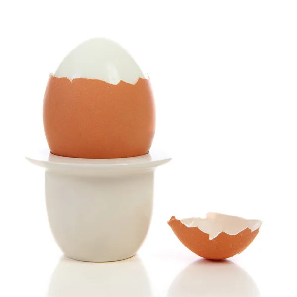 Peeled egg in holder — Stock Photo, Image