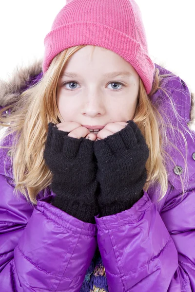 Tienermeisje is poseren in winter outfit over witte backgroung — Stockfoto