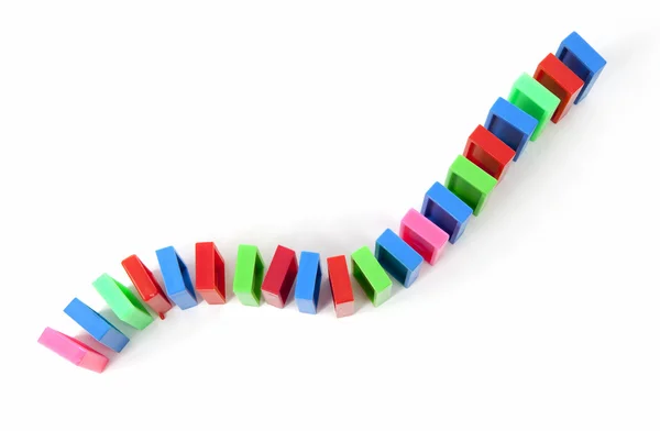 Colorful domino bricks in a row — Stock Photo, Image