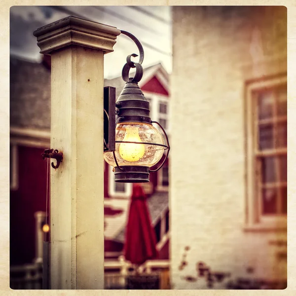 Lantern in a quaint, small town — Stock Photo, Image