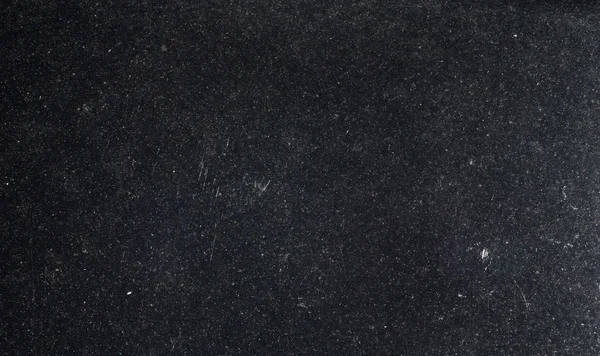Чёрная пятнистая текстура — стоковое фото