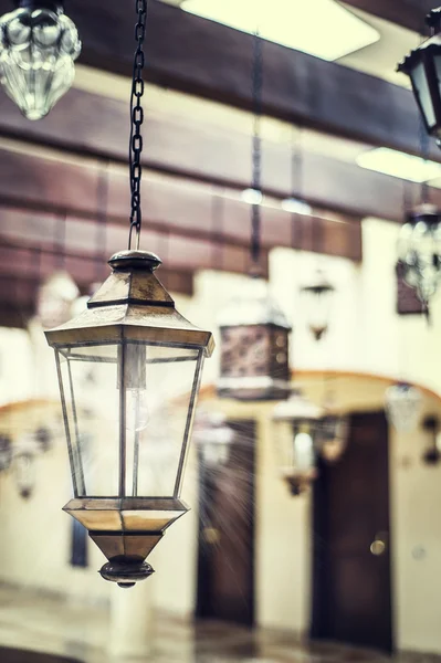 Lantern hanging from wood beams — Stock Photo, Image