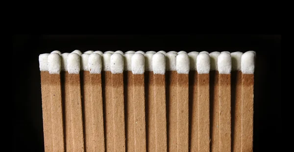 Matches on black — Stock Photo, Image