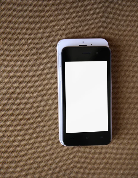 Chytrý telefon s izolovanou obrazovkou na dřevěné pozadí. — Stock fotografie