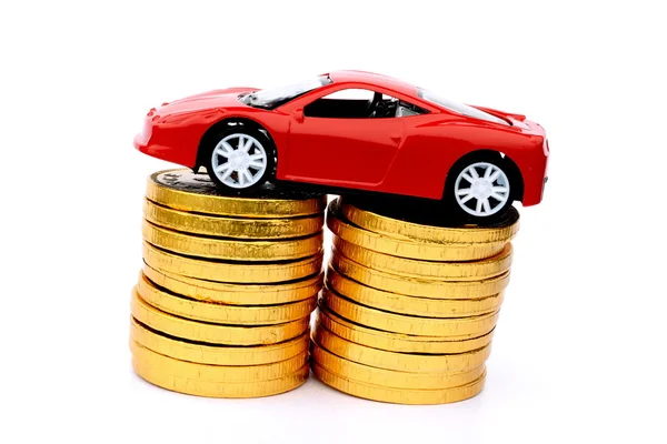 Stapel van munten en auto — Stockfoto