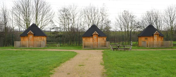 Wooden cabins in a park — Stock Photo, Image