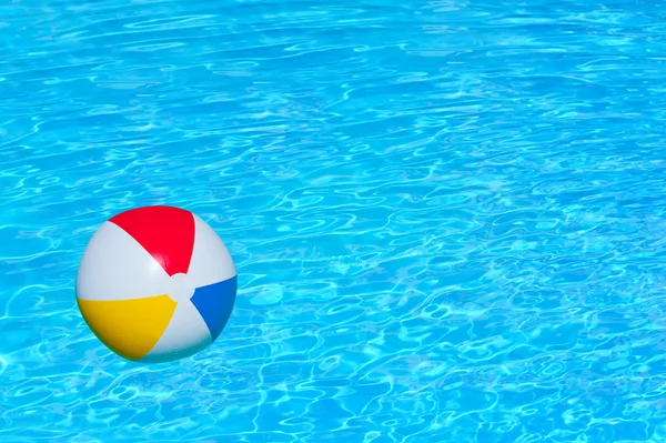 Inflatable ball in swimming pool — Stock Photo, Image