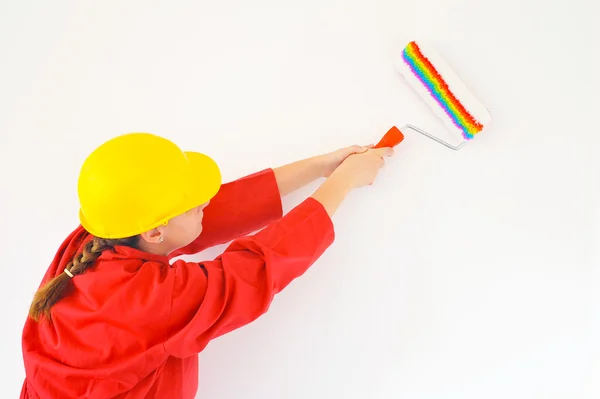Real female painter renovating her apartment Royalty Free Stock Photos