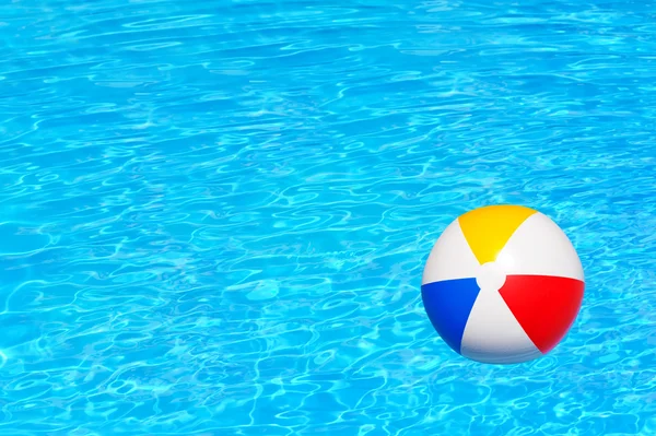 Inflatable ball in swimming pool — Stock Photo, Image