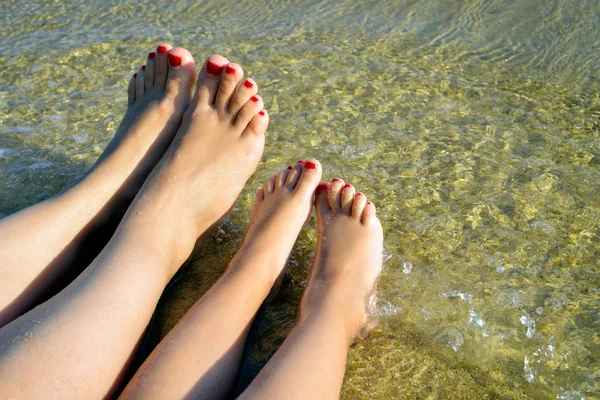 Legs in water — Stock Photo, Image