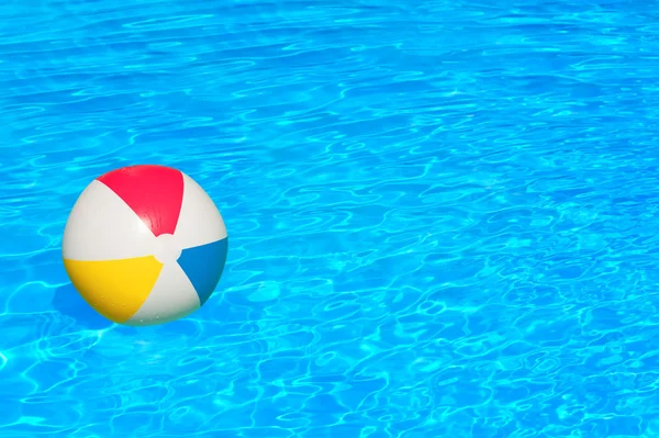 Inflatable ball in swimming pool — Stock Photo, Image