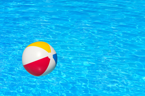 Inflatable ball in swimming pool