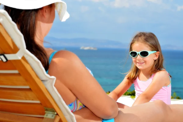 Adorable girl on sunbed — Stock Photo, Image