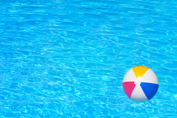 Inflatable ball in swimming pool