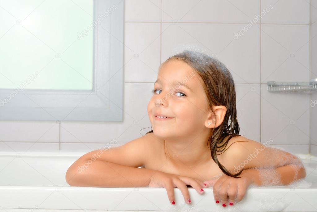Girl in a bathtub Stock Photo by ©pajche 76364897