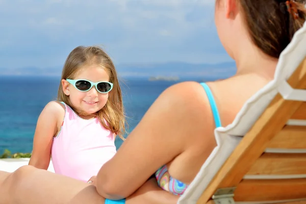 Adorable girl on sunbed — Stock Photo, Image