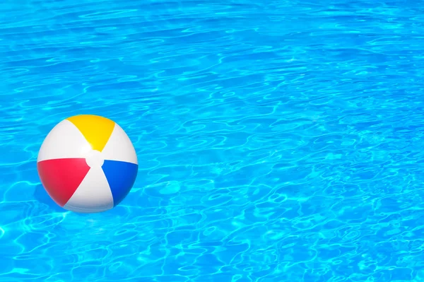 Inflatable ball in swimming pool — Stock Photo, Image