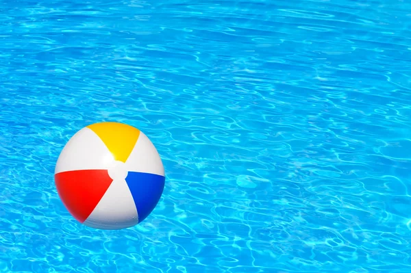 Inflatable ball in swimming pool — Stock Photo, Image