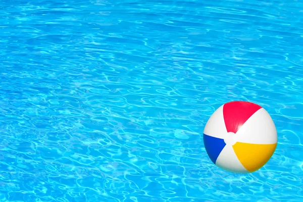 Inflatable ball in swimming pool — Stock Photo, Image