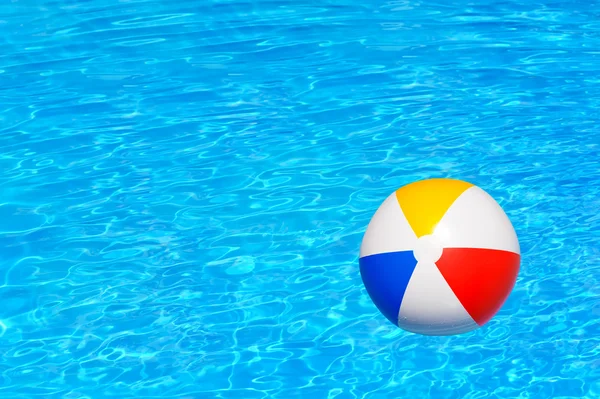 Inflatable ball in swimming pool — Stock Photo, Image