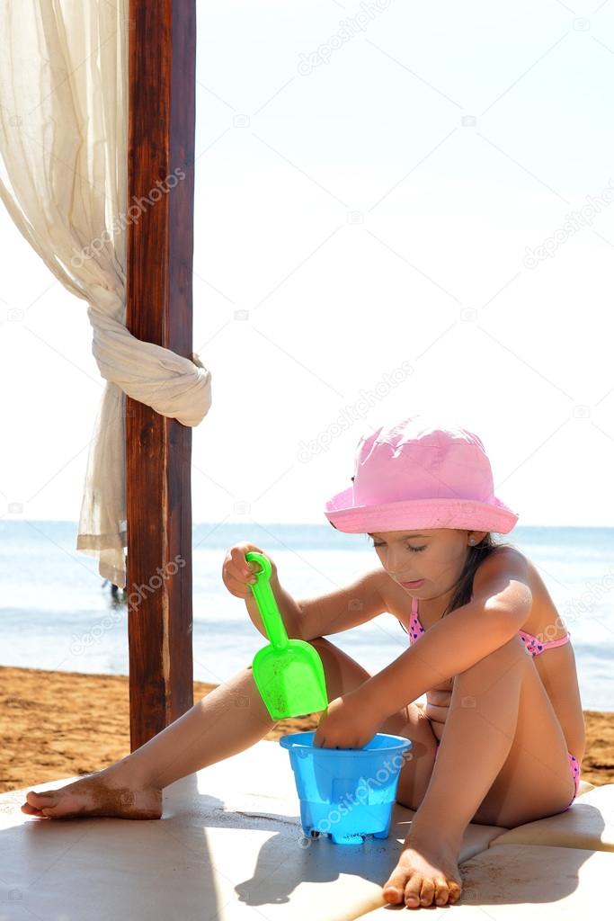 Real toddler girl enjoying her summer vacation