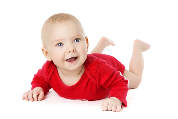 Bebé arrastrándose sobre blanco, niño feliz en rastreadores acostado — Foto de Stock