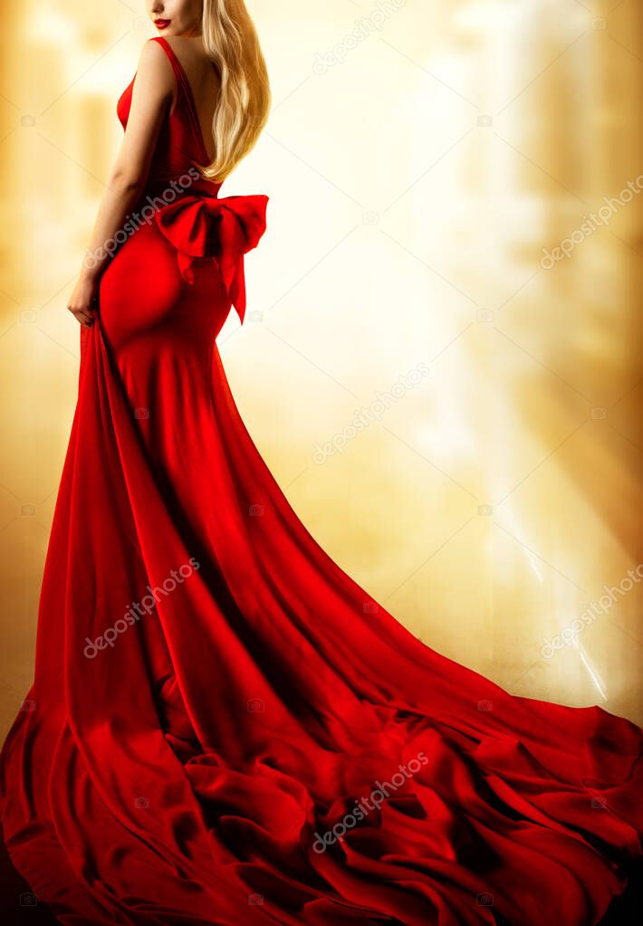 Model Red Dress, Fashion Blonde Woman in long Evening Gown Back Side View. Yellow Lighting Background