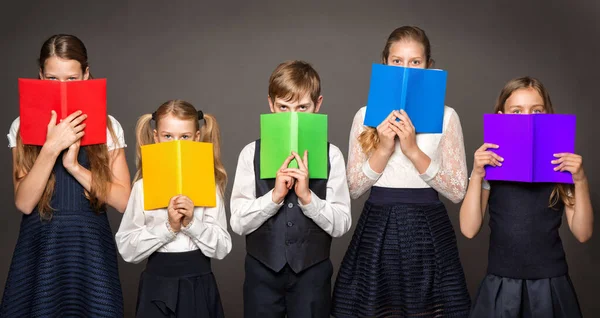 School Children Cover Face Book Kids Eyes Looking Camera Hiding — Stockfoto