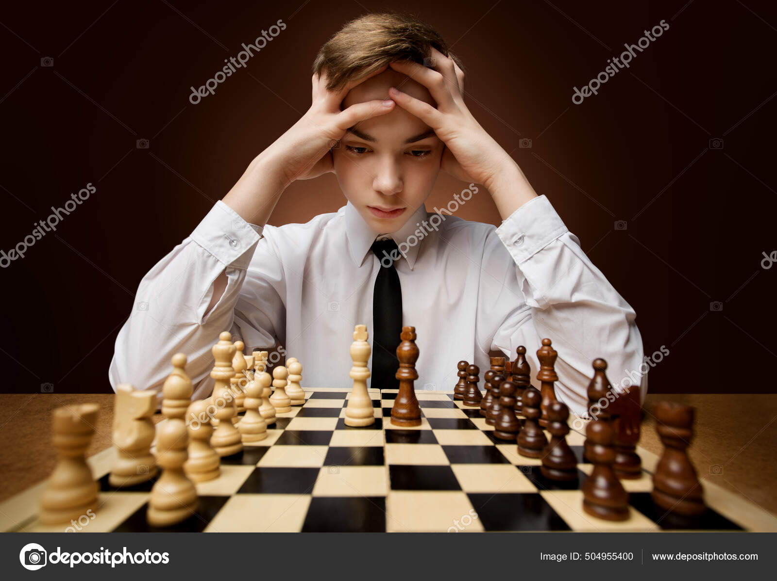 Man playing chess against computer - Stock Image - Everypixel