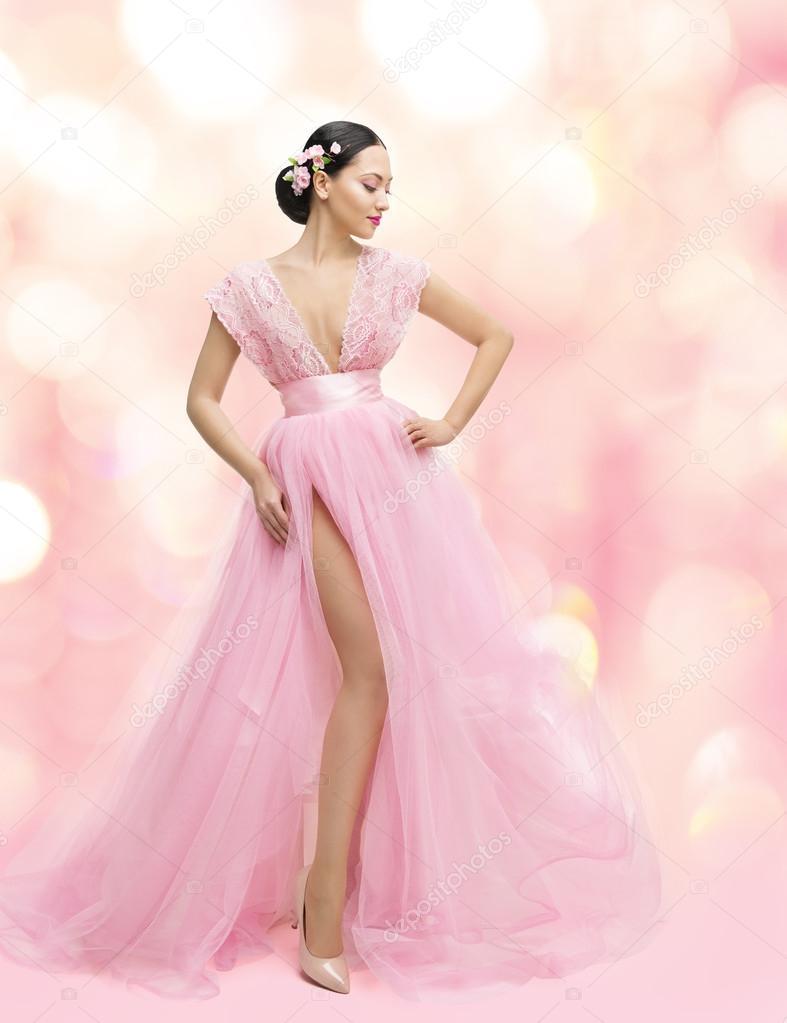 Woman Beauty Portrait in Pink Dress with Sakura Flower, Asian Girl Fashion Gown, Beautiful Model over Unfocused Background