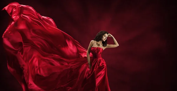 Red Dress, Woman in Flying Fashion Silk Fabric Clothes, Model Posing Waving Cloth — Stock Photo, Image