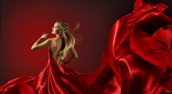 Woman in Red Dress Dancing, Fashion Model with Flying Cloth Fabric