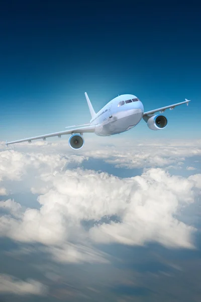 Airplane and clouds — Stock Photo, Image