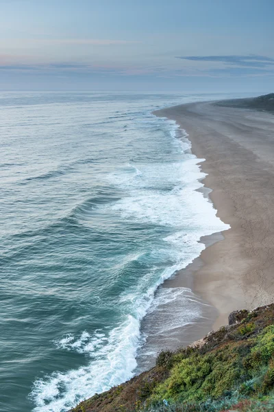 Plage au coucher du soleil — Photo